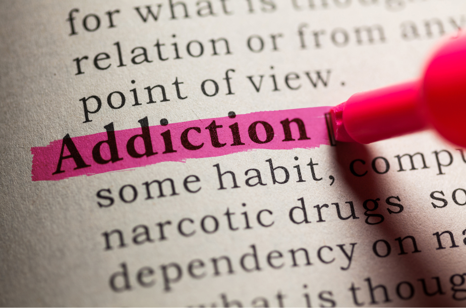 image of a dictionary page with the word "Addiction" highlighted in pink